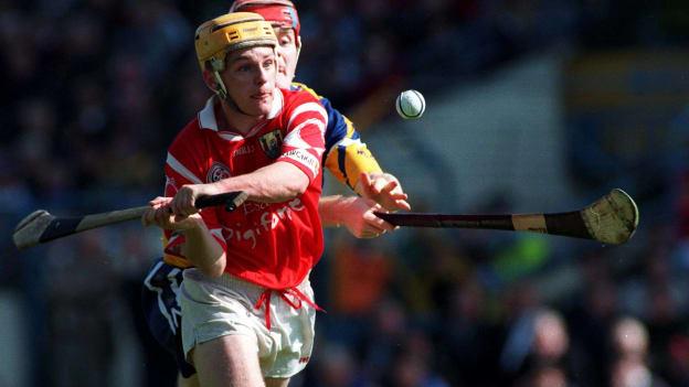 Joe Deane, Cork, and Brian Lohan, Clare, during the 1998 Allianz Hurling League Semi-Final at Semple Stadium.
