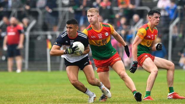 Daniel O'Sullivan, New York, and Ross Dunphy, Carlow, in Tailteann Cup action at Netwatch Cullen Park. Photo by Matt Browne/Sportsfile