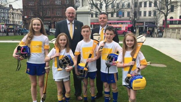 GAA President John Horan and Antrim GAA chairman Collie Donnelly pictured with the pupils of St Bride's at the 'Gaelfast' launch in 2018. 