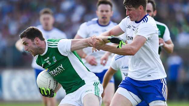Eoin Donnelly of Fermanagh in action against Darren Hughes of Monaghan during the Ulster SFC Semi-Final.