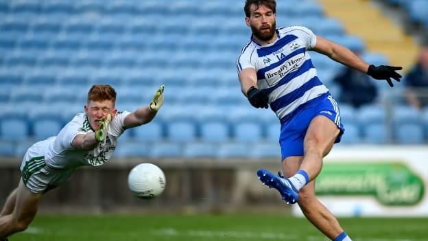 Na Craobhchomórtais Iomána agus Peile ag gabháil i ndéine