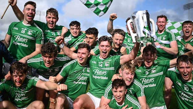 Naomh Éanna captain Conor McDonald, 14, lifts the Bob Bowe Cup as he celebrates with team-mates after their side's victory in the Wexford County Senior Hurling Championship final match between Naomh Éanna and Oylegate-Glenbrien at Chadwicks Wexford Park in Wexford. Photo by Piaras Ó Mídheach/Sportsfile.
