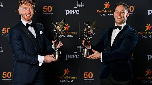Limerick hurler Cian Lynch (left) and Tyrone footballer Kieran McGeary pictured with their PwC All-Stars Players of the Year awards. 
