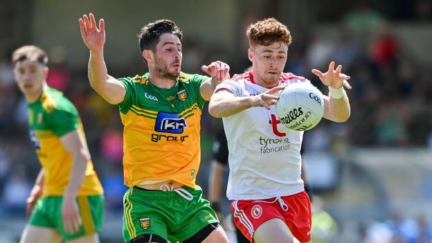 Conor Meyler of Tyrone in action against Ryan McHugh of Donegal during the Ulster GAA Football Senior Championship Semi-Final match between Donegal and Tyrone at Brewster Park in Enniskillen, Fermanagh. 