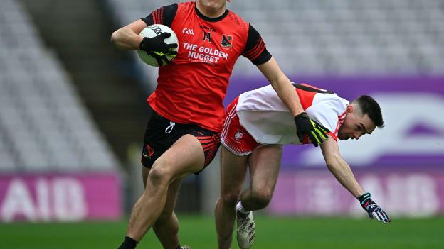 David Clifford of Fossa in action against Dylan McElhatton of Stewartstown Harps during the AIB GAA Football All-Ireland Junior Championship Final match between Fossa of Kerry and Stewartstown Harps of Tyrone at Croke Park in Dublin.