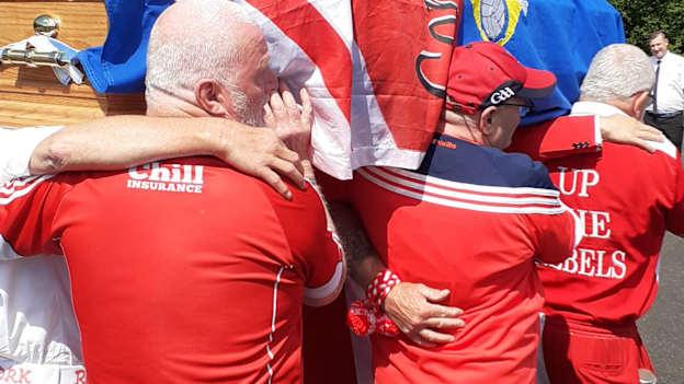 Timmy 'Jonty' O'Leary is carried by his friends on his final journey . 