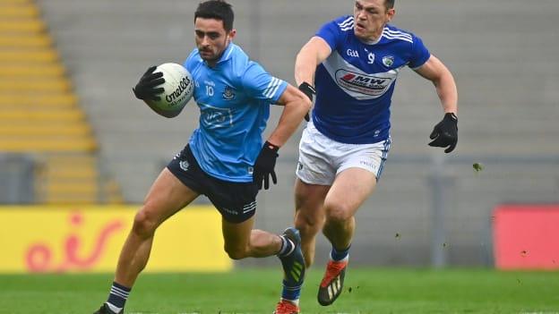 Niall Scully, Dublin, and John O'Loughlin, Laois, during the Leinster SFC semi-final at Croke Park.