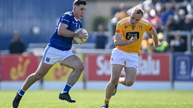 Killian BradY, Cavan, and Marc Jordan, Antrim, in Ulster SFC action at Corrigan Park.