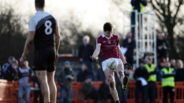 Shane McGuigan kicks a free for Slaughtneil.