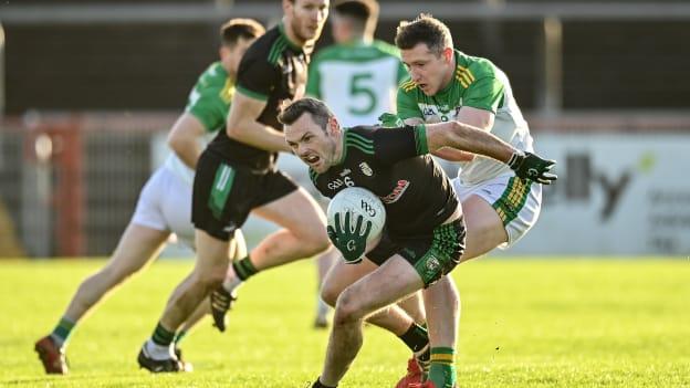 James Laverty, Erin's Own, Cargin, and Emmett Bradley, Glen, in AIB Ulster Club SFC action.