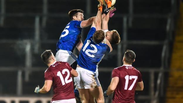 Westmeath goalkeeper Eoin Carberry is challenged by Thomas Galligan and Evan Doughty of Cavan during the Allianz Football League Division 2 Round 2 match between Cavan and Westmeath at Kingspan Breffni in Cavan. 