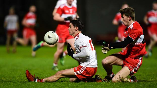 Darragh Canavan, Tyrone, and Paul McNeill, Derry, during a Bank of Ireland Dr McKenna Cup clash at Celtic Park in December.
