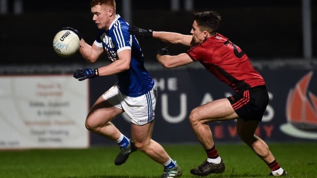 Colm Murphy, Laois, and Daniel McCarthy, Down, in Allianz Football League action at Pairc Esler.
