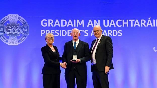 Hugh Rudden of Ballyhaunis GAA, Mayo, is presented with the Education Award by Maolmhuire Tynan, Head of Public Affairs AIB, and Uachtarán Chumann Lúthchleas Gael John Horan during the GAA President’s Awards at Croke Park in Dublin.