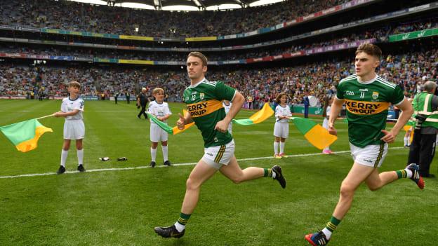 Kenmare Shamrocks clubmates Stephen O'Brien (left) and Sean O'Shea run out onto the pitch before the drawn 2019 All-Ireland SFC Final against Dublin.