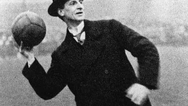Eamon de Valera throwing in the ball at Croke Park, 1919
