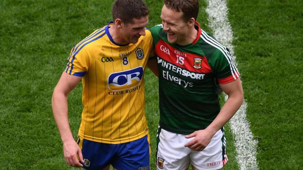 Fintan Cregg, Roscommon, and Andy Moran, Mayo, following the game at Croke Park.