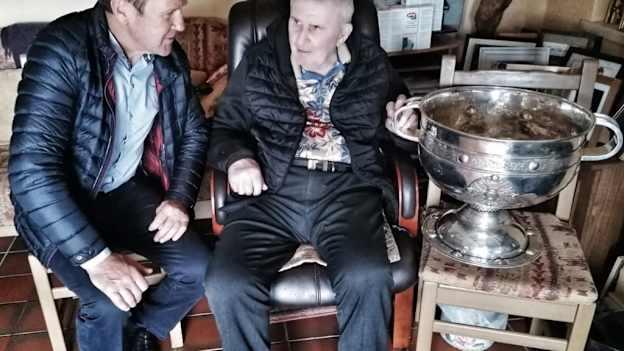 The 2022 portrait by Cian O’Connor that shows Kerry manager Jack O’Connor bringing the precious Sam Maguire to the home of the legendary Mick O’Dwyer after their All-Ireland success wins the 2022 MacNamee Award for best photograph. 