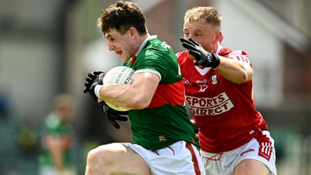 Paddy Durcan, Mayo, and Killian O'Hanlon, Cork, in All-Ireland SFC action. Photo by Eóin Noonan/Sportsfile