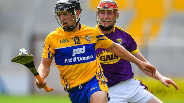 David Reidy, Clare, and Diarmuid O'Keeffe, Wexford, in All Ireland SHC Quarter-Final action at Pairc Ui Chaoimh.