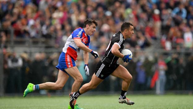 Neil Ewing, Sligo, and Danny Sutcliffe, New York, during the Connacht SFC preliminary round clash at Gaelic Park.