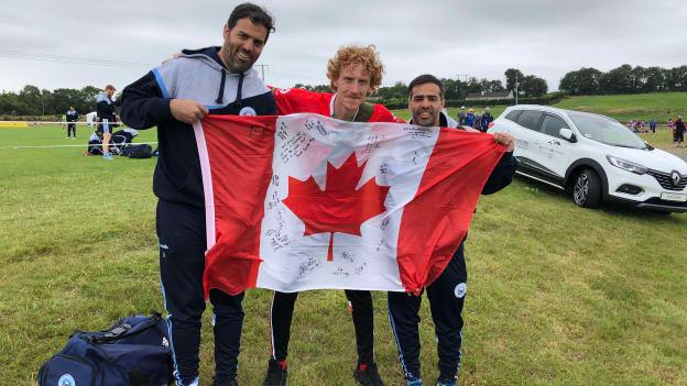 Jonny Lajeunesse with two Argentinean players at the 2019 GAA World GAmes in Waterford. 