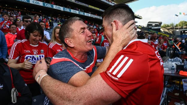 Seán O'Donoghue of Cork celebrates with his father Paddy following during the GAA Hurling All-Ireland Senior Championship semi-final match between Kilkenny and Cork at Croke Park in Dublin. 