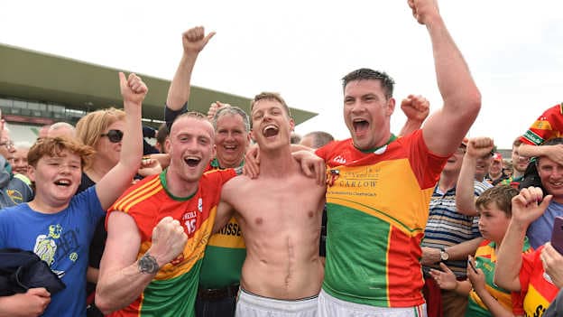 Carlow players from left Cian Lawler, Paul Broderick and team captain John Murphy celebrate after their 2018 Leinster SFC Quarter-Final victory over Kildare.