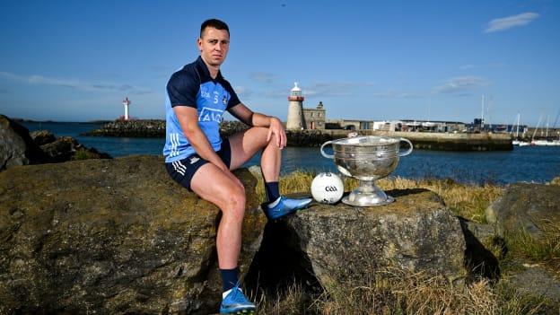 Cormac Costello of Dublin poses for a portrait with the Sam Maguire cup at the 2023 GAA Football All-Ireland Series national launch in Howth, Dublin. Photo by Brendan Moran/Sportsfile.