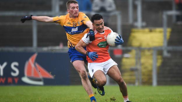 Jemar Hall of Armagh in action against Dale Masterson of Clare during the Allianz Football League Division 2 Round 2 match between Armagh and Clare at Páirc Esler in Newry, County Down. 