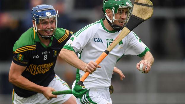 Kevin Connolly of Coolderry gets past Enda Grogan of Kilcormac/Killoughey on his way to scoring his side's first goal during the Offaly County Senior Club Hurling Championship Final.