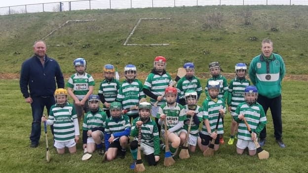 Team mentors Kevin Carney (right) and Davy Cunningham pictured with the Cootehill Celtic U-11 hurlers. 