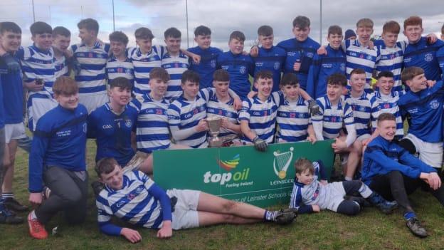 The Knockbeg footballers celebrate after winning the Leinster Junior 'A' Football title. 