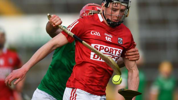 Jack O'Connor of Cork is pulled back by Barry Nash of Limerick during the Allianz Hurling League Division 1 Group A Round 4 match between Limerick and Cork at LIT Gaelic Grounds in Limerick.