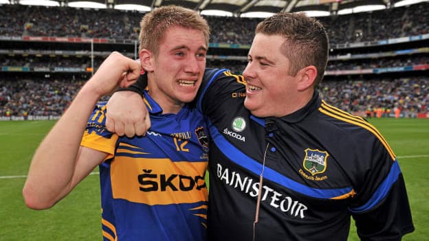 Bill Maher and David Power celebrate following Tipperary's All Ireland minor football victory in 2011.