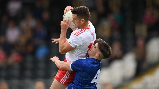 Darren McCurry, Tyrone, and Cian Reilly, Cavan, in Ulster SFC action.