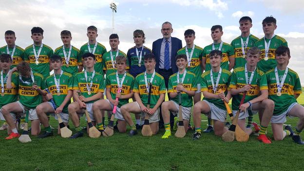 GAA President Larry McCarthy with the Castleblayney U17 Hurlers after their 2021 Táin Óg final win in Abbottstown.