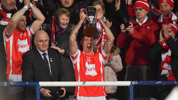 Cuala captain Paul Schutte lifts the Tommy Moore Cup in the company of GAA President John Horan after the AIB GAA Hurling All-Ireland Senior Club Championship Final replay match between Cuala and Na Piarsaigh at O'Moore Park in Portlaoise, Laois.