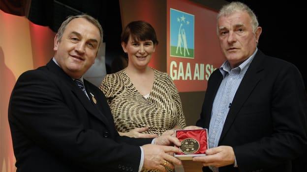 Mick Roche being presented with a commemorative medal to in 2006 to mark his All Star in 1971.