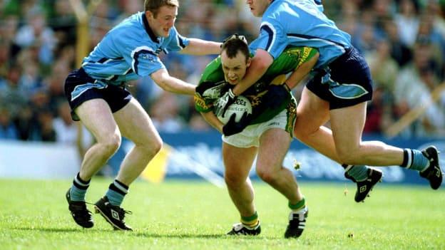 Coman Goggins and Johnny Magee, Dublin, surround Johnny Crowley, Kerry, at Semple Stadium.