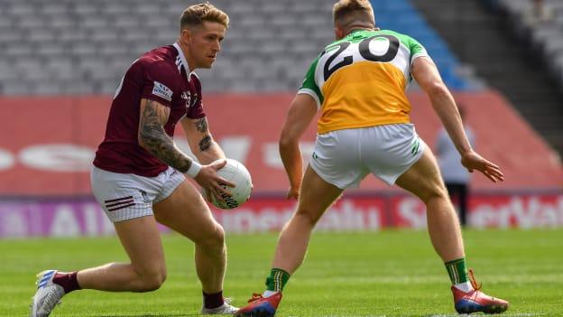 Luke Loughlin, Westmeath, and David Dempsey, Offaly, in Tailteann Cup action at Croke Park.