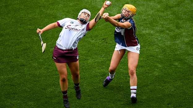Dervla Higgins, Galway, and Megan Dowdall, Westmeath, during the All Ireland Intermediate Camogie Final at Croke Park.
