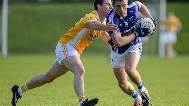 Shane Carey of Scotstown in action against Pauric Boyle of Clontibret O Neills during the Monaghan County Senior Club Football Championship Final.