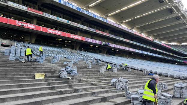 Workers remove seating from the Cusack Stand in Croke Park in preparation for its refurbishment. 