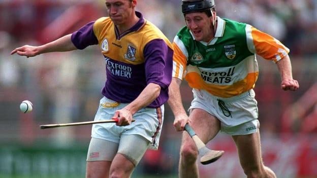 Wexford's Larry Murphy gets away from Offaly's Brian Whelahan in the 1996 Leinster SHC Final. 