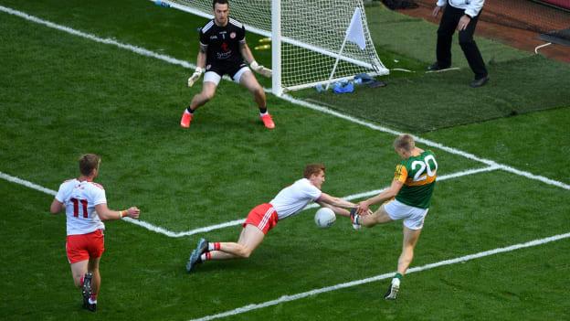 Killian Spillane of Kerry has his shot blocked by Peter Harte of Tyrone during the GAA Football All-Ireland Senior Championship semi-final match between Kerry and Tyrone at Croke Park in Dublin.