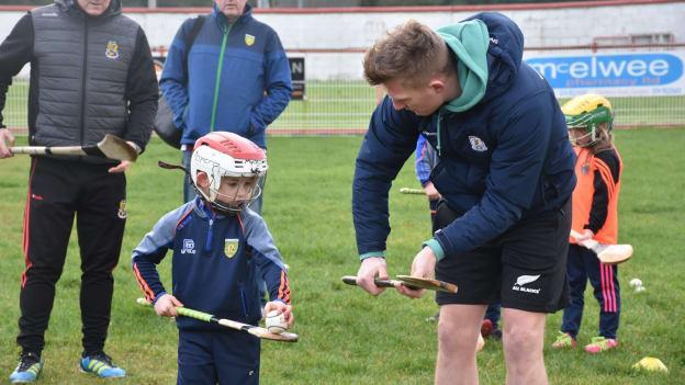 Galway star Joe Canning giving some tips to a young Dungloe hurler. The club have made a big effort to bring in players and coaches from outside the club to pass on their wisdom. 