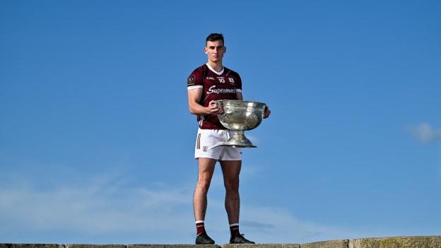 Matthew Tierney of Galway poses for a portrait with the Sam Maguire cup at the 2023 GAA Football All-Ireland Series national launch in Howth, Dublin. Photo by Brendan Moran/Sportsfile.