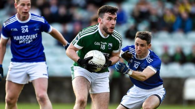 Niall Friel, Gaoth Dobhair, and Kevin McGettigan, Naomh Conaill, in action during the Donegal SFC Final replay.