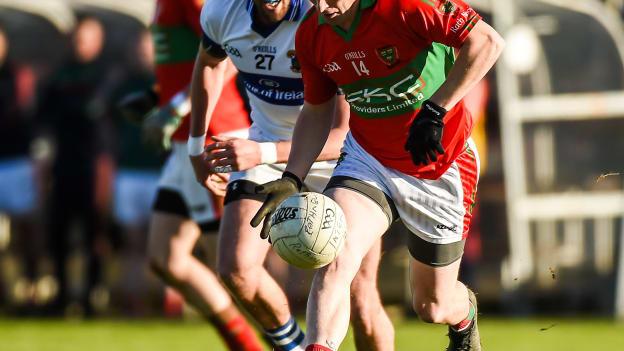 Rathnew stalwart Leihgton Glynn drives forward in Aughrim.